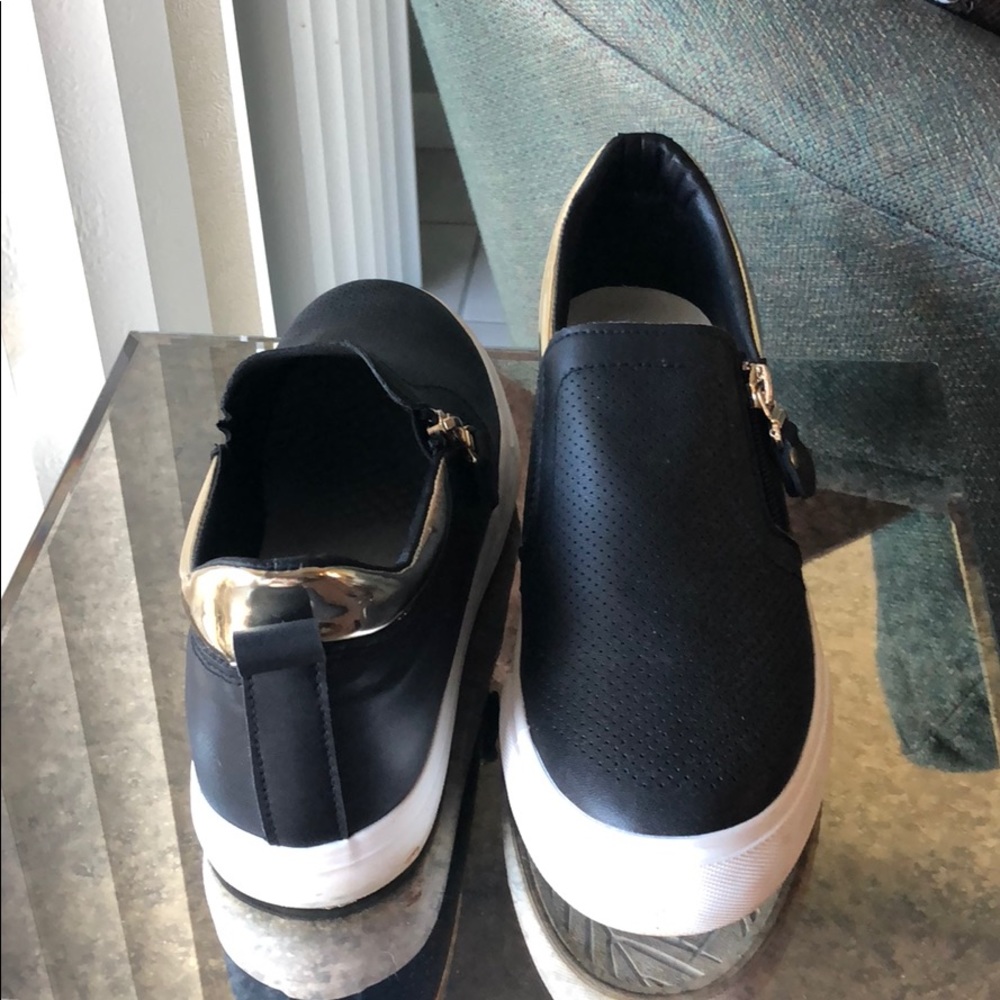 Black slip on platform sneakers